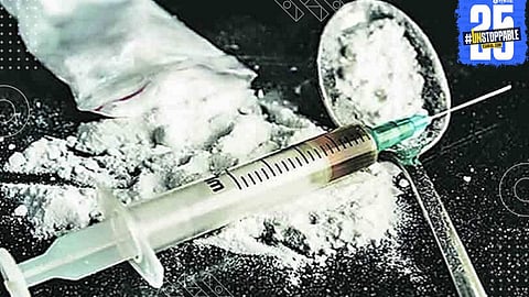 ATS and Coast Guard officials display seized narcotics after a successful joint operation in the Arabian Sea.