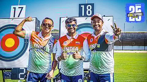 Dhiraj Bommadevara celebrates his bronze medal win as the Indian men's team secures silver at the World Archery Championship.