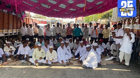 Frustrated farmers block the highway in Mangalwedha demanding full-pressure water release from Ujani dam for their parched fields.