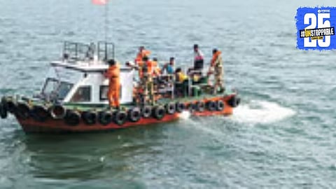 The capsized boat in Ranpar estuary after all 16 passengers were rescued safely from a life-threatening sea safari mishap.