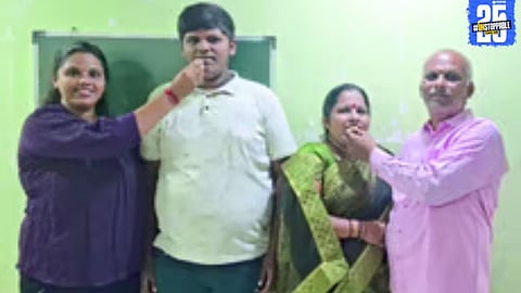 A proud mother from Mandrulkole celebrates her SSC success with her children, proving that age and responsibilities are no barrier to learning.
