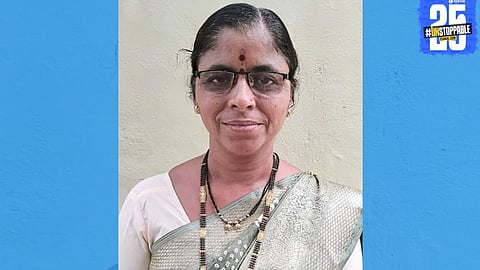 Indira Ghadge, 54, proudly holds her SSC result — a symbol of perseverance and belief in lifelong education.
