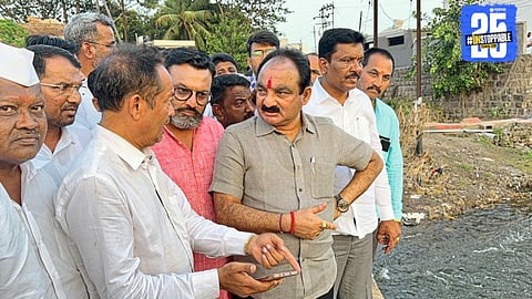 Minister Makrand Patil during field survey in Phaltan Taluka to assess rain damage and assure immediate aid.