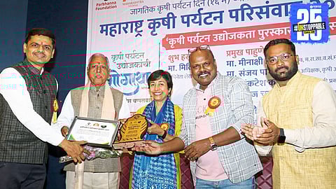 Bansi and Dr. Vishal Tambe being felicitated in Pune for their award-winning Krishibhushan Agro Tourism venture.