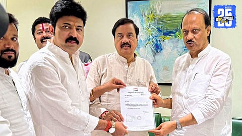 Ajit Pawar presenting appointment letter to Umesh Patil as NCP’s new district president