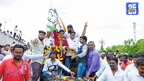 Umesh Patil receives grand welcome as new NCP district chief; 400-vehicle rally from Shetfal showcases massive support.