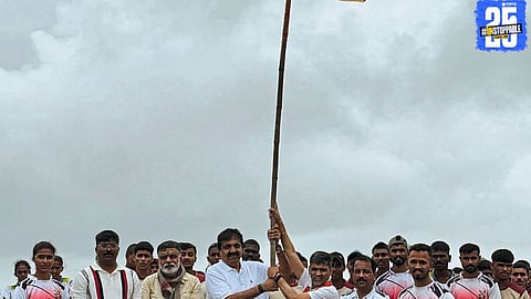 MLA Jayant Patil with volunteers during a rainy day cleanup drive at Ramshej Fort, raising awareness for fort preservation.