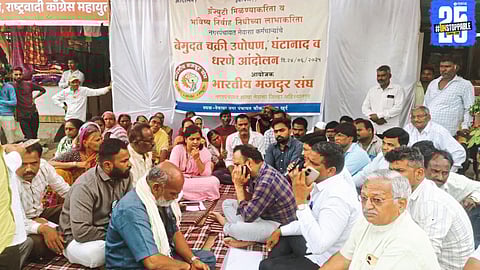 Nagar Panchayat workers during protest for PF release; families of deceased staff await justice.