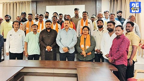 Rajendra Yadav welcomes Karad North office bearers into Shiv Sena during a special event in Satara.