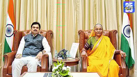 A proud mother in traditional Irkal attire arrives at the Maharashtra Assembly to witness her son's moment of glory.