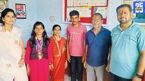 "Namrata, blind but determined — mastering computers with strong support from her parents."