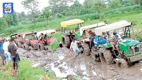 Ten Tractors Stuck in Mud