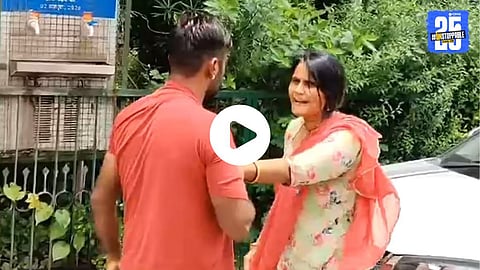 A woman in Jodhpur publicly hits her husband with a helmet after catching him with her sister, claiming an illicit affair; crowd gathers and incident is captured on video.