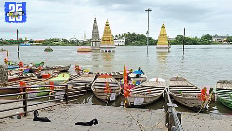 Bhima River flowing calmly near Pandharpur after Ujani Dam discharge reduced; flood risk averted.