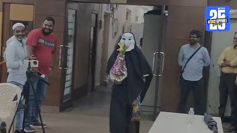 Protesters dressed as ghosts stage a unique demonstration outside Vasai-Virar Municipal Corporation to oppose swings and gym equipment in a crematorium