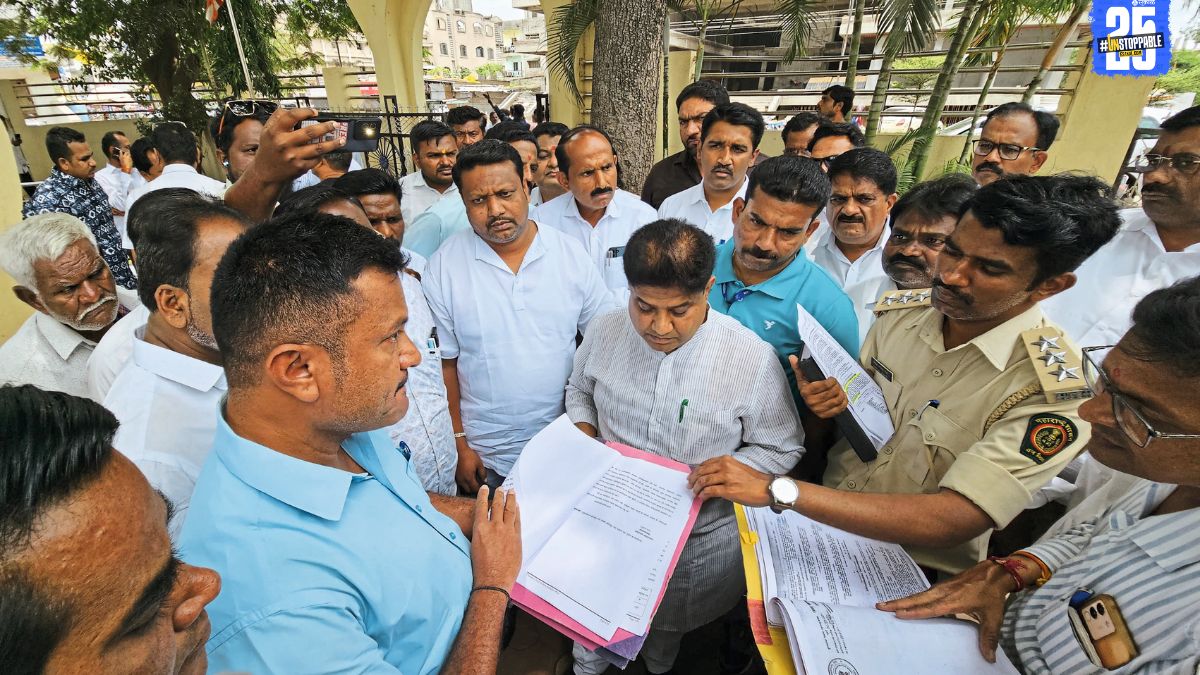 Officials begin land inspection for the upcoming Dr. Babasaheb Ambedkar Memorial, as political tensions rise over credit claims.