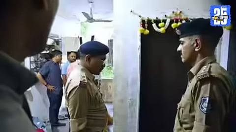 Crime scene in Surat where a sports teacher allegedly poisoned his two children and later hanged himself; police recovered rat poison and began investigation.