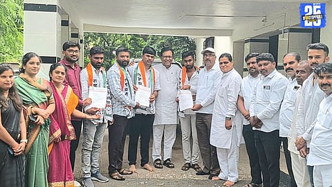 Kashinath Date addressing party workers during the announcement of new office bearers, urging unity and organizational strength.