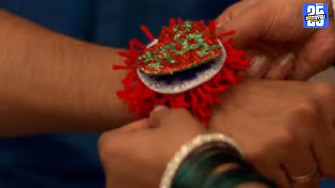 Women tying rakhi to local representatives during a Sakal Hindu Samaj protest, demanding action against Love Jihad through symbolic public appeal.
