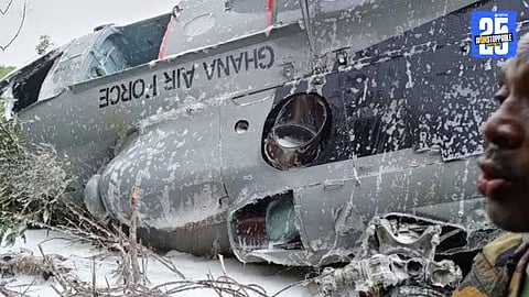 Wreckage of the Ghanaian military helicopter burning in a dense forest, following the fatal crash that killed Defence and Environment Ministers.