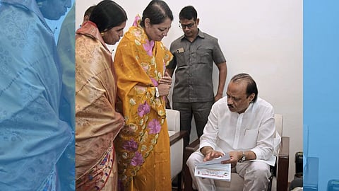 Minal Sathe submitting a petition to Ajit Pawar seeking ₹52 crore for Madha’s water supply scheme.