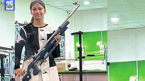 "Janandini Kale from Ahilyanagar proudly displays her gold medal after qualifying for the divisional competition."