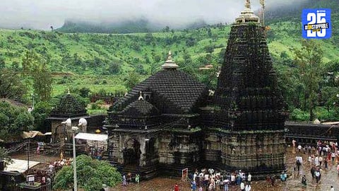 "Security personnel controlling chaos as devotees clash at Trimbakeshwar Temple during Shravan month rush."