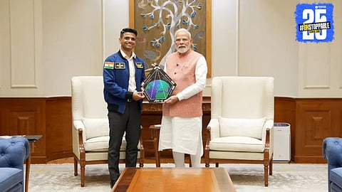 Indian astronaut Subhanshu Shukla meets Prime Minister Narendra Modi and presents a special gift, highlighting India’s space achievements.