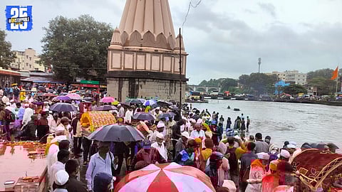 “Devotees throng Wai’s Krishna Ghat as Mahaganpati Temple area comes alive with palanquins and festive celebrations.”