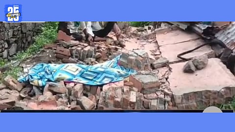 one dead in wall collapse