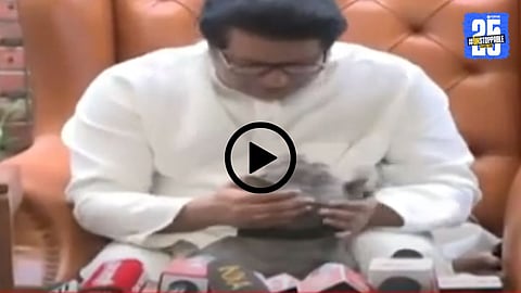 Raj Thackeray cuddles his pet dog Rhino during a press conference, creating a lighthearted viral moment.