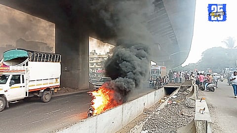 E-bike catches fire at Dhebewadi flyover on Pune-Bangalore highway; rider escapes by moving bike away from the road