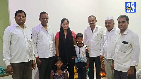 Boy cycles from Kamaragaon to Pune, longing for his late father but safe in the embrace of his mother.