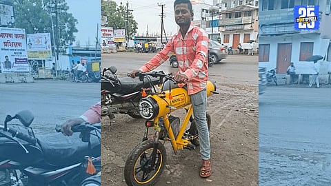 Arts graduate Nikhil from Wakhari proudly displays his innovative e-cycle built entirely from scrap material.