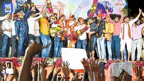 Supporters shower flowers on Manoj Jarange during his grand welcome in heavy rain at Nepti Chowfula.