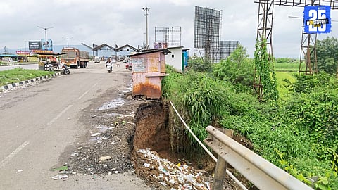 Collapsed service road near Anewadi toll plaza on Pune-Bengaluru highway sparks safety concerns.