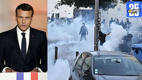 Protesters in France holding banners during the ‘Block Everything’ movement demanding political changes and questioning President Macron’s leadership.