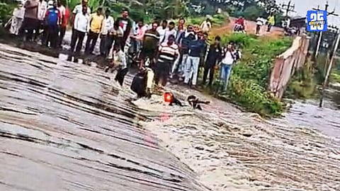 Flood fury in North Solapur: Two motorcycles washed away from Telgaon bridge after heavy rains.