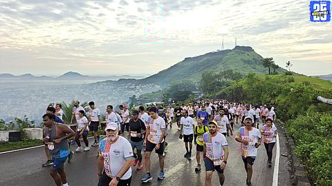 Runners enjoy the thrill of JBG Satara Hill Half Marathon 2025 amidst scenic hills.