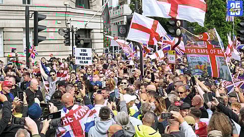 Clashes erupt between police and right-wing protesters during anti-immigrant march in Britain.