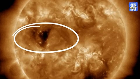 NASA massive butterfly coronal hole Sun geomagnetic storms aurora