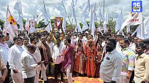 Banjara community members stage a two-wheeler rally to Akkalkot tehsil office demanding Hyderabad Gazette implementation.