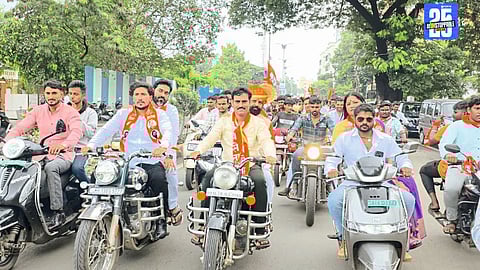 Minister Bharat Gogawale inaugurating development works and addressing citizens through a rally ahead of municipal elections.