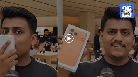 A customer shows excitement after buying the iPhone 17 Cosmic Orange, a trending color that sparked viral news across India.