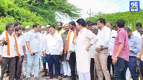 MLA Raju Khare interacting with farmers in Mohol taluka while inspecting crop damage.