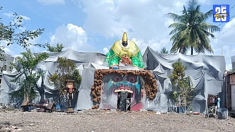 Devotees admire the Mahishasur Jungle theme decoration at Mangalwedha Navratri festival, a major district attraction.