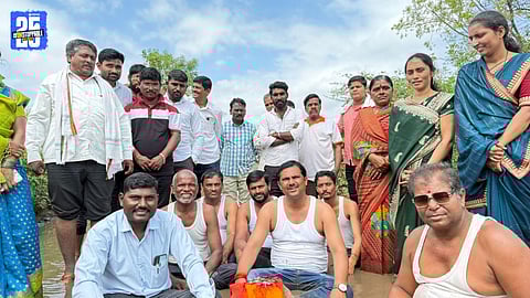 Current and ex-sarpanch of Kanhipur stage pothole sit-in protest over year-long road delay.
