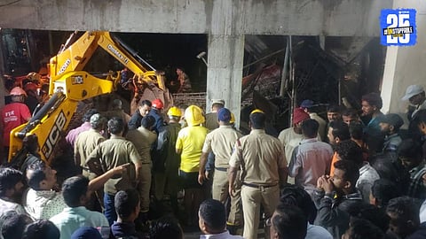 Rescue teams at the site of the collapsed building slab in Kolhapur’s Phulewadi area.