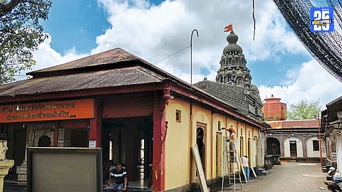 Renovation works underway at Sajjangad temple with painting and railing installation near the Mahadwar.