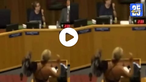 A woman protests at a California school board meeting by stripping down to a bikini, sparking debate over transgender student policies.